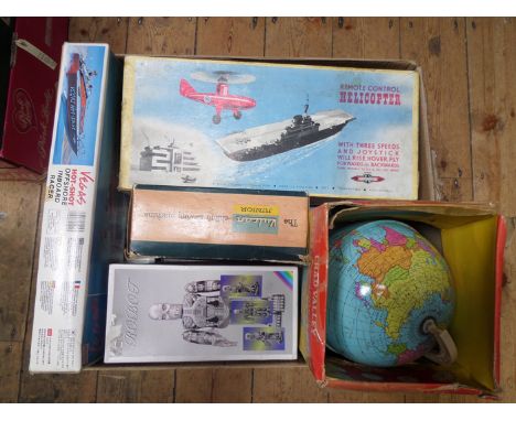 A quantity of various battery powered/clockwork toys etc. A Chad Valley ‘Educational Globe of the World’. A tinplate globe wi