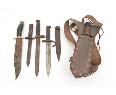 An old home made bowie type knife,  blade 10”, with brass crosspiece and wooden grips, in a western style tooled leather shea