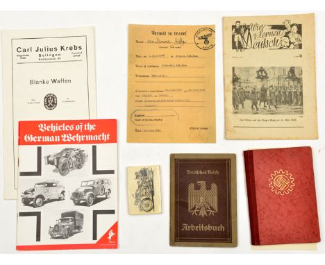 A Third Reich DAF Mitgliedsbuch, with stamps from October 1935 to October 1942; an Arbeitsbuch with entries from 1941-46; a r