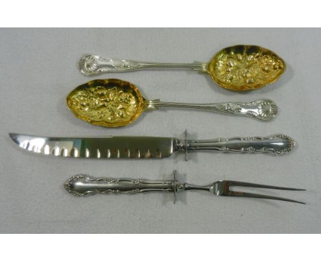 A pair of Victorian silver plated kings pattern berry spoons with gilt bowls, 22.2cm long and carving knife and fork with sil