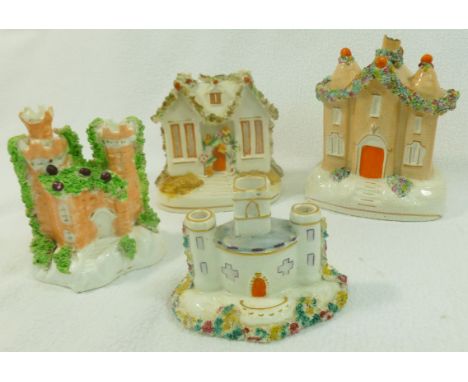 Four Staffordshire pottery pastille burners in the form of castles and a cottage and a small Stafforshire flatback of a house