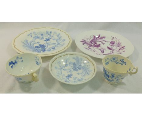 An H & R Daniel porcelain trio and a dessert plate, all first gadroon shape with gilt banding and blue transfer printed flora