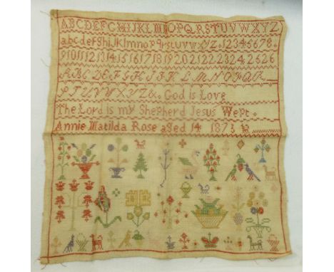 Three Victorian samplers, the first by Annie Matilda Rose, aged 14, dated 1873, sewn with flowers, birds, letters, numerals, 