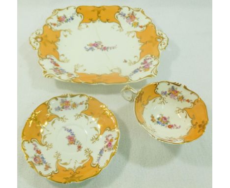 Three pieces of H & R Daniel porcelain comprised of a bread and butter plate, 28cm long, and a cup and saucer, first bell sha