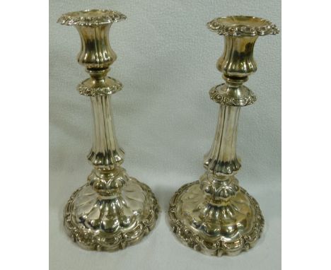 A pair of William IV silver candlesticks, Sheffield 1831, by T J and N Creswick, with acanthus scroll and shell decoration, d