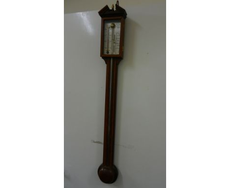 A reproduction mahogany cased stick barometer with broken pediment and line inlay, 95cm long CONDITION REPORT: If you require