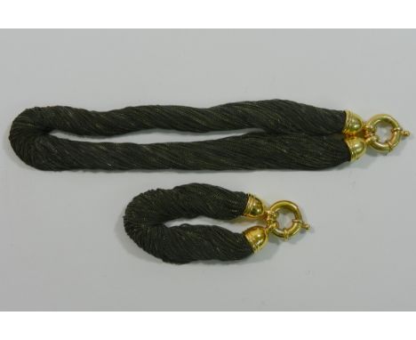 A 'Pascal at Liberty' necklace and bracelet, the multiple fine chain bracelet and necklace with large silver gilt ring clasps