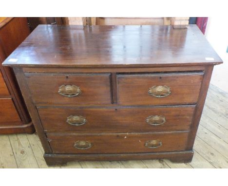 An Edwardian Mahogany chest of two short and two long drawers