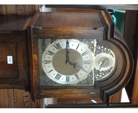 A reproduction Oak longcase clock with Westminster, St Michael and Whittington chimes