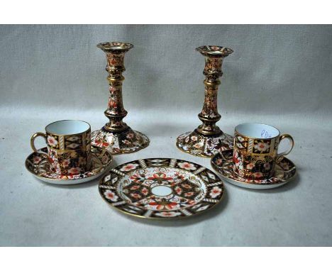 A collection of seven items of Edwardian Royal Crown Derby consisting of a pair of Candlesticks, 15.5cm high, date code 1910,