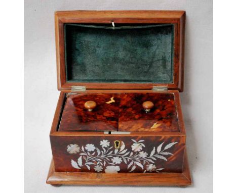 A Georgian style rosewood, tortoiseshell and mother of pearl inlaid double Tea Caddy of sarcophagus shape, the hinged lid wit