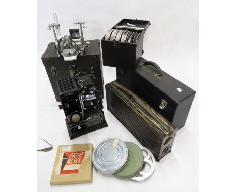 A cased Kodak Kodascope cine-camera, corresponding cased Kodascope resistor, a quantity of cased and loose film reels, spare 