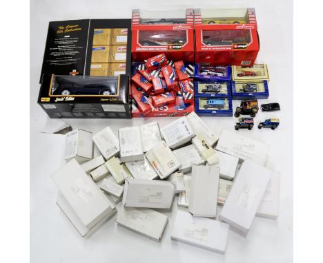 A collection of mostly boxed model vehicles of varying scales, to include Burago 1:24-scale Mercedes-Benz SSK (1928), Jaguar 