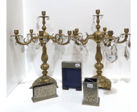 A pair of gilt metal candelabra with glass drops, together with a metal desk set Condition Report:Available upon request
