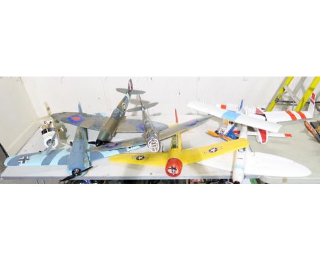 Assorted large-scale polystyrene remote control aircraft, including two Spitfires; three remote control units, three unassemb