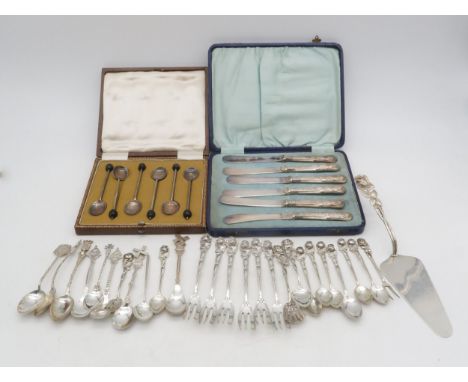 A collection of silver, white metal and EPNS cutlery, including a cased set of silver coffee spoons, by Cooper Brother &amp; 