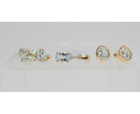 three items of Gems TV, Aquaiba beryl jewellery to include a three stone ring with diamonds, size J1/2, a pendant and a pair 