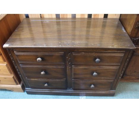 A mid 20th century elm and beech Ercol chest of six drawers, 70cm high x 98cm wide x 49cm deep Condition Report:Available upo