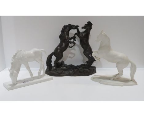 Willi Munch-Khe (1885-1960) - A Meissen figure of a Feeding Foal, model 78714, a Du Boulay porcelain figure of a Levade horse
