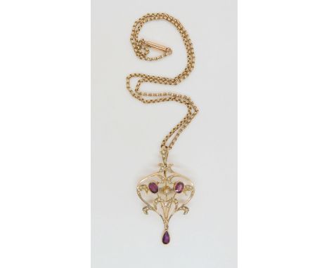A 9ct gold Edwardian garnet and pearl pendant, pendant stamped 9ct, vintage yellow metal belcher not hallmarked. Length of pe