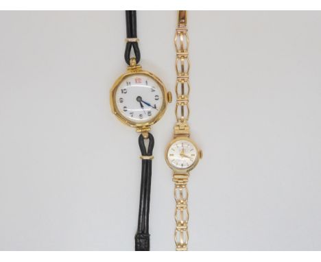 A 9ct goldÊ ladies Uno watch and strap, together with a 9ct gold ladies vintage watch, weight with both mechanisms and leathe