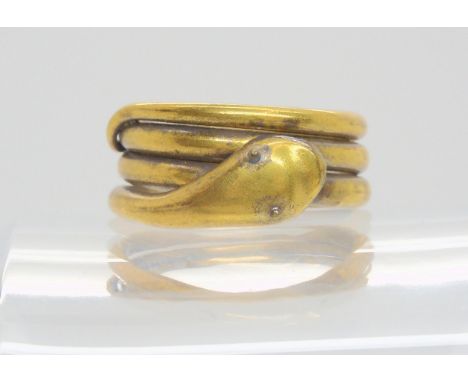 A Victorian rolled gold coiled snake ring, finger size P1/2, weight 6.4gms Condition Report:Available upon request