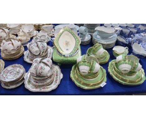 A Coalport teaset, the white ground with green band printed in gilt with grapes and vines, Midwinter bowl, three New Chelsea 