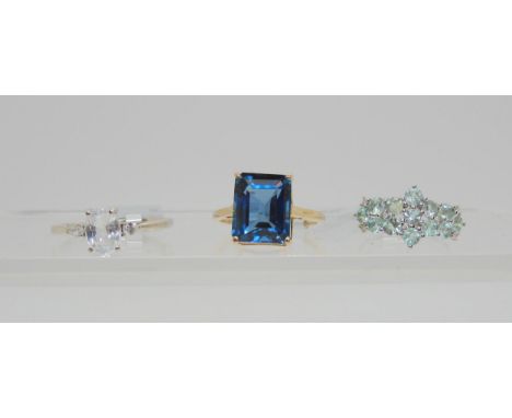 A GemsTV 9ct gold London blue topaz ring, size Q, an aqua blue beryl and diamond ring, size L1/2 (with Gemporia Cert) togethe