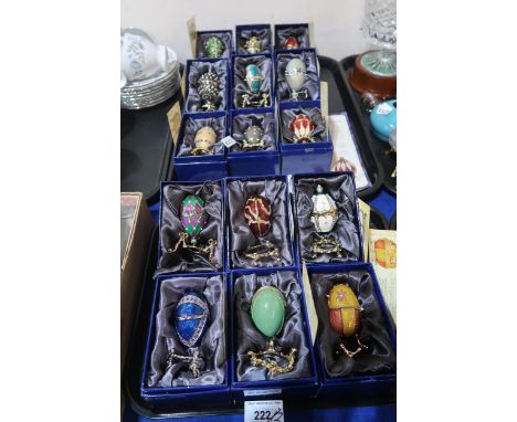 A collection of fifteen Atlas Edition Faberge style enamel eggs, all with boxes and certificates Condition Report:No conditio