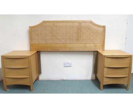 A pair of contemporary beech Ercol three drawer bedside chests and a bergere headboard (3) Condition Report:Available upon re