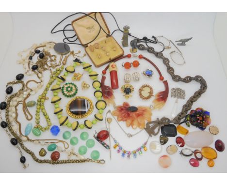 An early plastic flower necklace, and parrot shaped scent bottle, a collection of agate loose gemstones and glass gems, and o