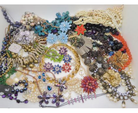 A large box full of statement necklaces, collars, a bangle and brooches Condition Report:No condition report available.