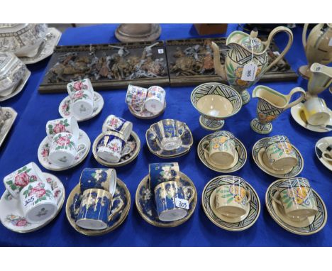 A Wedgwood Arts and Crafts part coffee set hand painted with flowers within a crosshatch border, marked AMH 8695 together wit