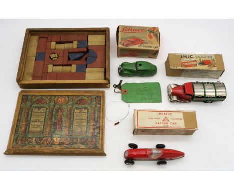 A boxed Tri-ang Minic tinplate clockwork model racing car, a boxed Minic Dust cart, a boxed Schuco Telestring Car and a set o