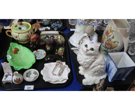 A Beswick model of a cat, no 1867, a Carlton Ware Hollyhocks plant pot, a Royal Winton Iris vase, a Nao figure of a girl, min