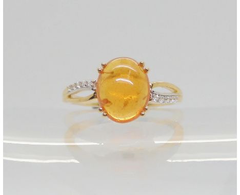 A 9ct GemsTv ring set with a mandarin garnet and white zircon, size O, weight 2.7gms, with a Gemporia certificate.Ê Condition