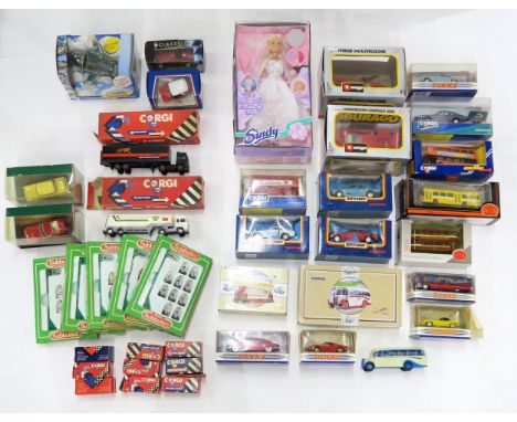 A selection of boxed toys and scale model vehicles, to include Corgi Classics, Dinky, Matchbox Superkings, Burago and Subbute