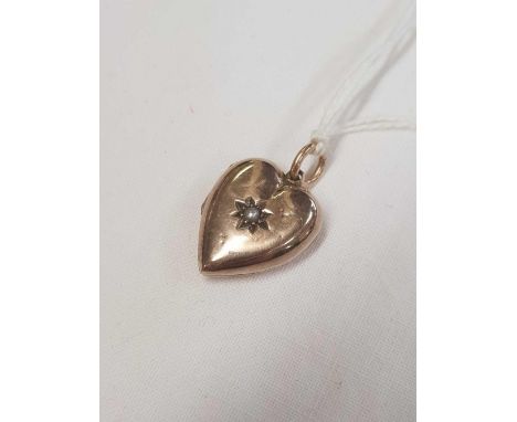 AN ANTIQUE (UNMARKED) HINGED HEART LOCKET INSET WITH PEARL