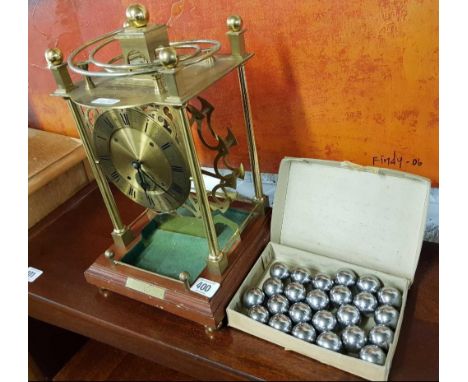 SPHERICAL WEIGHT CLOCK