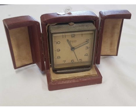 SMALL BRASS CASED SWIZA TRAVEL CLOCK IN CASE