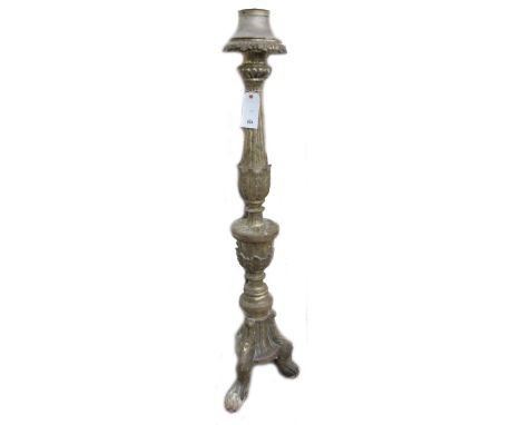An Italian giltwood altar candlestick (converted), 19th century, of fluted foliate carved form, on three lions paw feet, 145c