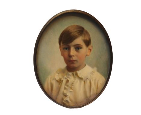 An early 20th century Swedish school over-painted portrait miniature of a young boy, in a Swedish strutback silver frame hall