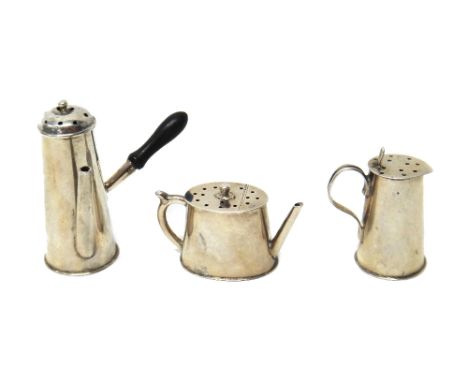 Three late Victorian silver novelty pepperettes, comprising; a miniature oval teapot, Chester 1896, a miniature chocolate pot