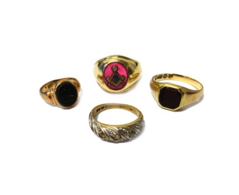 A 9ct gold and red gem set Masonic signet ring, with a square and compasses motif, a Victorian 15ct gold and black onyx set s