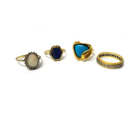 A 9ct gold, opal and diamond set oval cluster ring, an 18ct two colour gold and colourless gem set full eternity ring and two