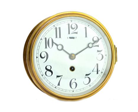 A brass cased ship's dial clock, early 20th century, the 6.5inch white enamel dial with slow/fast adjustment and painted numb