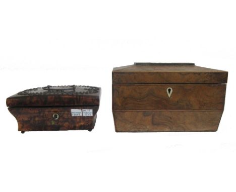 A 19th century figured walnut sarcophagus shaped tea caddy, with twin lidded interior, 21cm wide x 13cm high, together with a