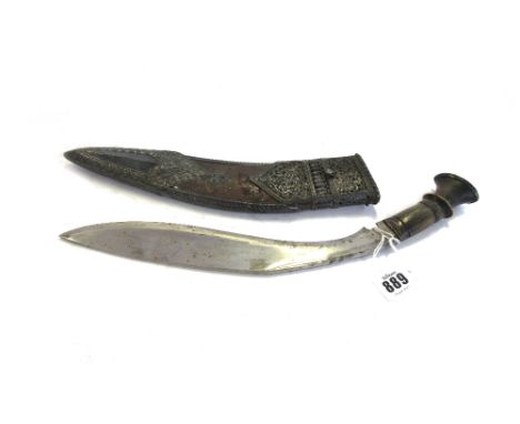 A Kukri with shaped steel blade engraved 'Captain Katu Jhafa 44th GR', with horn handle and silver mounted scabbard.