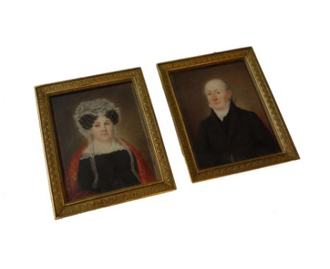 Anders Gustaf Anderson (1780-1833), Sweden, a pair of portrait miniatures on ivory of a husband and wife, signed and dated in