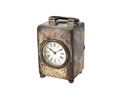 A late Victorian silver rectangular cased carriage clock timepiece, with a French movement, the undecorated case with a hinge